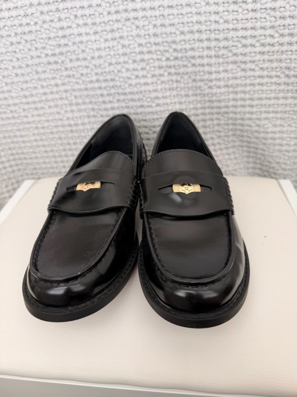 Classic Black Penny Loafers with Gold Accent